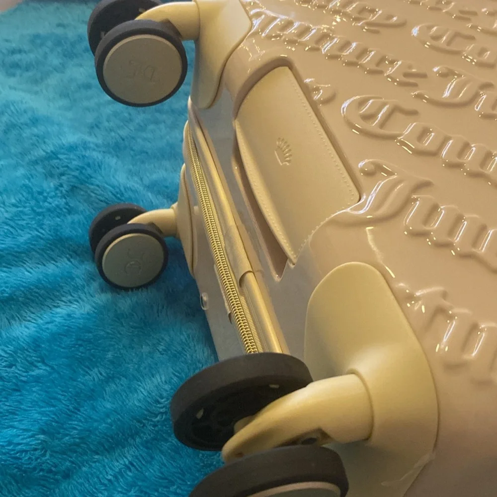 Brand New Beautiful Juicy Couture Luggage Set.
Cream in Color Hard Shell. NWT - Picture 4 of 6